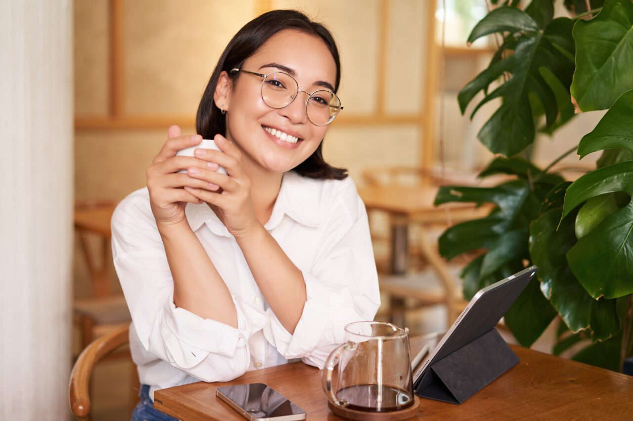 Smiling Asian Girl in Glasse