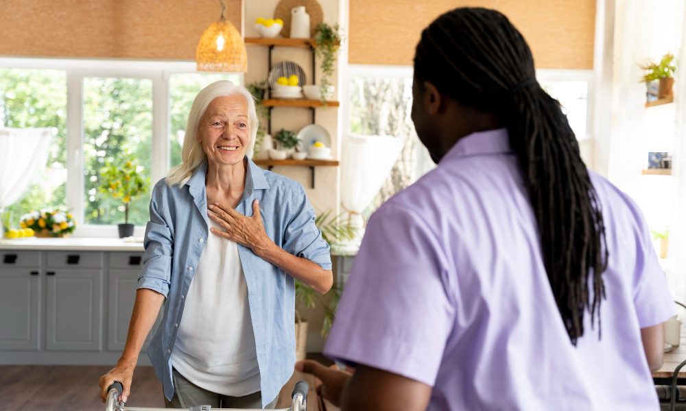 african-social-worker-taking-care-senior-woman-e1696937986217